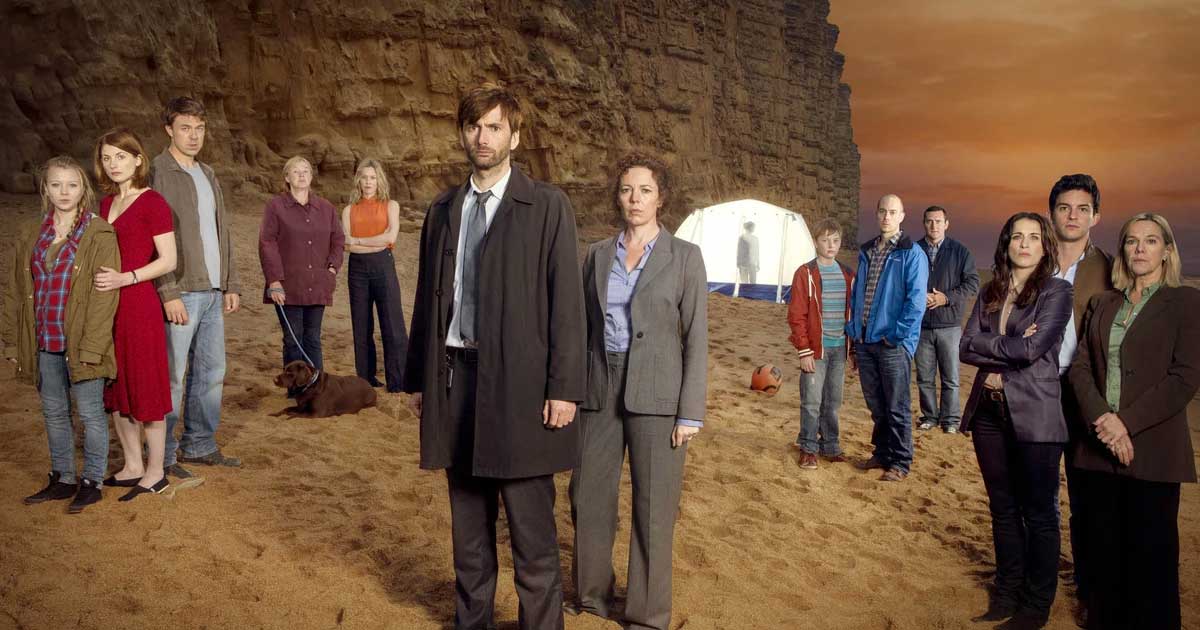 Broadchurch cast standing on a beach
